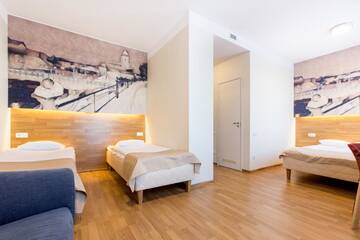 Фото номера Стандартный трехместный номер Отель Narva Hotell г. Нарва 3